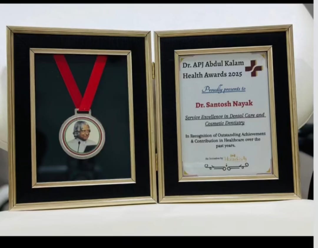 Framed Dr. APJ Abdul Kalam Health Awards 2025 certificate presented to Dr. Santosh Nayak for service excellence in dental care and cosmetic dentistry